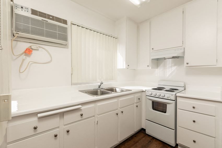 The Reno Country Club Apartments, 120140 S. Reno St., Los Angeles, CA